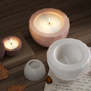 Macro detail of geometric hexagonal silicone mold set with pink candle crafts