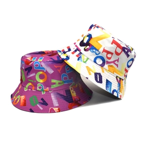 Outdoor bucket hats with colorful letter prints in purple and white reversible cotton