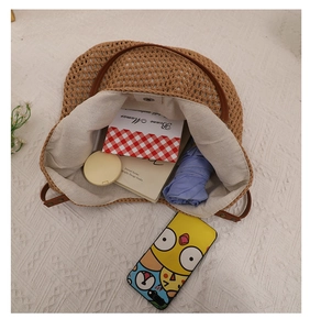 Top view of hollow woven cotton tote bag showing inner storage capacity and brown handles