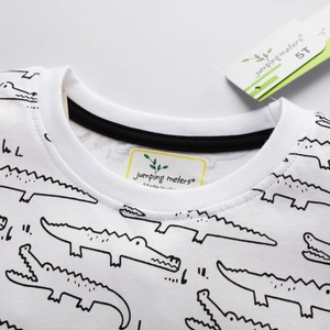 T-shirt bianca da bambino in cotone con stampa di coccodrilli neri all-over