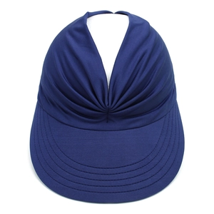 Close-up of a navy blue sun visor with stylish ruched fabric detail on the front.