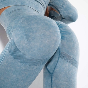 Detail of seamless acid wash yoga set featuring scrunch butt leggings and honeycomb texture