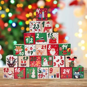 24-piece colorful Christmas advent calendar boxes set stacked on a rustic wooden table
