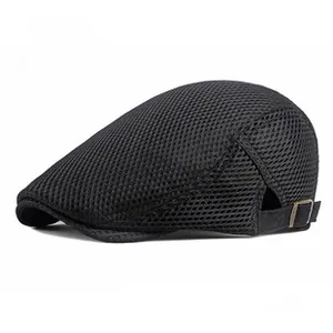 Detail of black mesh beret cap with bronze adjustable side buckle for ventilation