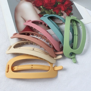 Matte finish square hollow hair clips in six colors on a white textured background