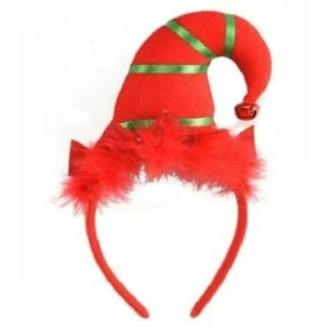 Macro shot of festive elf hat headband with red green stripes and feather trim decoration