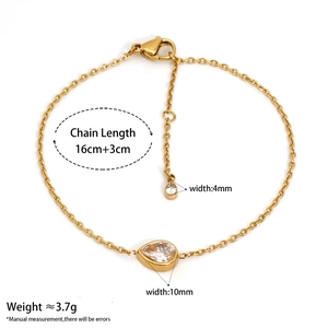 Elegant gold stainless steel bracelet with a sparkling teardrop zircon pendant on white