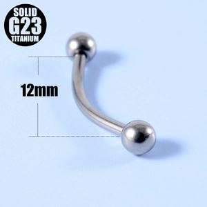 Macro view of G23 titanium curved barbell piercing jewelry with 12mm bar length