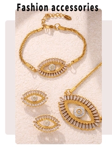 Macro detail of 18k gold plated evil eye jewelry set with zircon on beige texture
