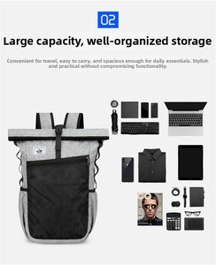 Flat lay of light grey roll-top backpack showcasing high capacity for travel and office items