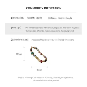 Size chart showing 44.7cm length and 137.9g weight for the vintage ceramic floral necklace