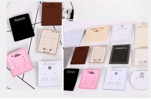 Detail showing various fashion jewelry earring display cards in multiple colors and styles