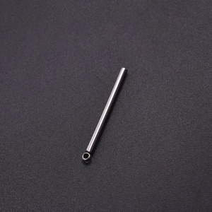 Close-up of a silver 304 stainless steel bar pendant with an attachment ring for DIY necklaces