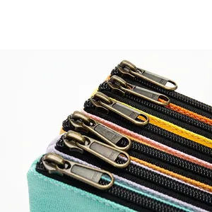 Handmade canvas coin purse featuring premium colorful YKK metal zippers in multiple layers