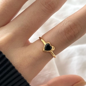 Minimalist gold plated 925 sterling silver heart ring worn on finger for women