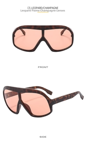 Front and side views of leopard print oversized shield sunglasses with champagne lenses