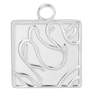 Macro detail of square stainless steel pendant with elegant silver rose floral engraving