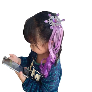 Detailed view of kids purple gradient wavy hair extension with snowflake rhinestone clip