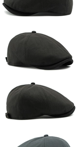 Detailed close-up of retro baker boy caps showing thick twill fabric and metal buckles