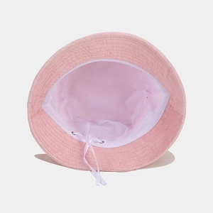 Pink terry cloth bucket hat with mama embroidery and adjustable white mesh lining