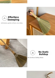 Detailed view of handmade grass broom cleaning pet hair from tiles without static