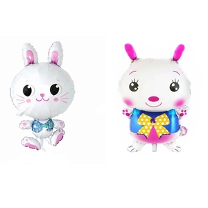 Detail of two cartoon rabbit foil balloons in white and pink for Easter party decor