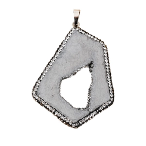 Agate geode pendant with irregular rock texture and crystal rhinestones on white background