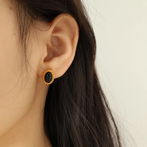 French vintage gold earrings with oval black stone and twisted rope texture for women