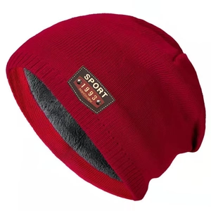 Classic red cable knit beanie for men and women with warm fleece lining and sport leather tag