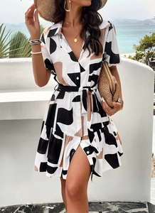 Elegant short sleeve shirt dress with abstract geometric print and waist tie for summer wear