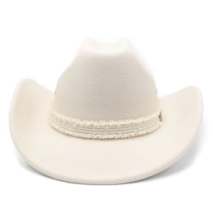 Detail of cream cowboy hat with woven tassel band and classic textured felt finish