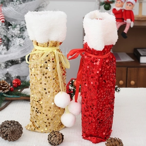 Sparkling sequin Christmas wine bottle covers with plush trim and ribbon decorations
