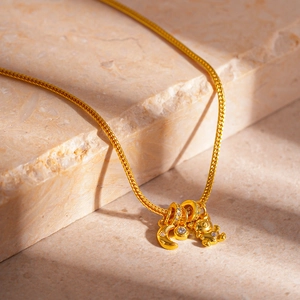 Minimalist gold moon and bear pendant necklace with cubic zirconia on stone base