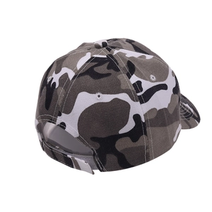 Detail of adjustable velcro strap on a grey camo baseball cap with six-panel construction