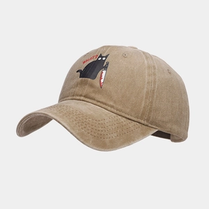 Detail of distressed brown cotton baseball cap with funny cat embroidery and What? text