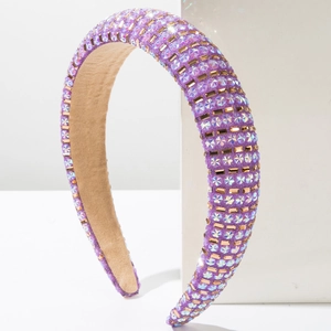 Serre-tête baroque violet rembourré avec strass en étoile et cristaux dorés brillants