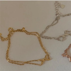 Minimalist double layer twisted chain bracelet with X-shaped charm in three colors