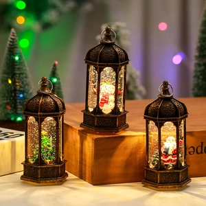 Set of 3 vintage bronze Christmas lanterns with Santa, Snowman and Tree water globes