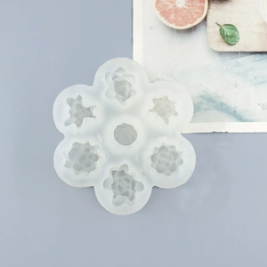 Detailed top view of 8-cavity translucent white silicone mold for 3D succulent candles