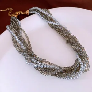 Multi-layer vintage beaded necklace with grey pearls and crystals on a gold chain