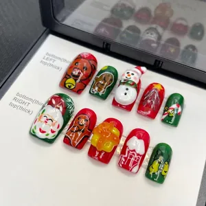 Handmade 3D Christmas press-on nails featuring Santa, snowman, and reindeer designs