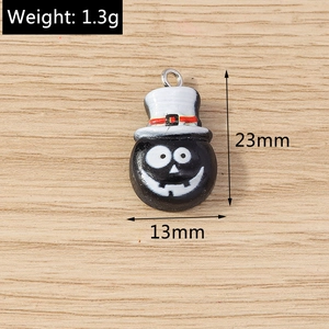 Detailed size view of a black ghost charm with top hat for Halloween jewelry DIY