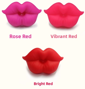 Three silicone baby pacifiers in rose red and vibrant red lip designs on white background