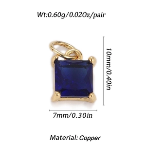 Detail shot of blue zircon heart pendant with gold copper frame and product dimensions