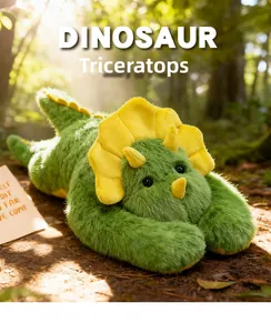 Close-up of a plush green triceratops doll lying on autumn leaves in a sunny forest