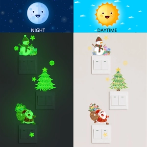 Luminous Christmas switch stickers showing glow-in-the-dark snowman and Santa patterns