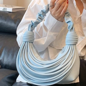 Light blue ruched handle hobo bag with unique layered curved decorative strips