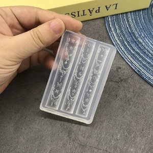 Translucent silicone nail art mold featuring starry moon and bead chain patterns