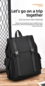 Macro view of black water-resistant nylon backpack featuring buckle straps and side pockets
