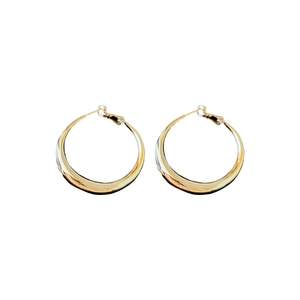 Minimalist gold geometric hoop earrings with polished metal finish for women